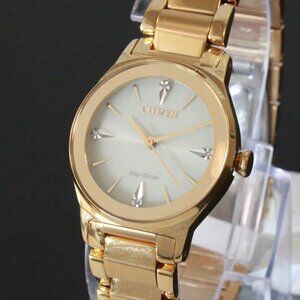 Eco Drive Ladies Axiom Watch Gold Tone Champaign Dial Diamond Accents 28mm